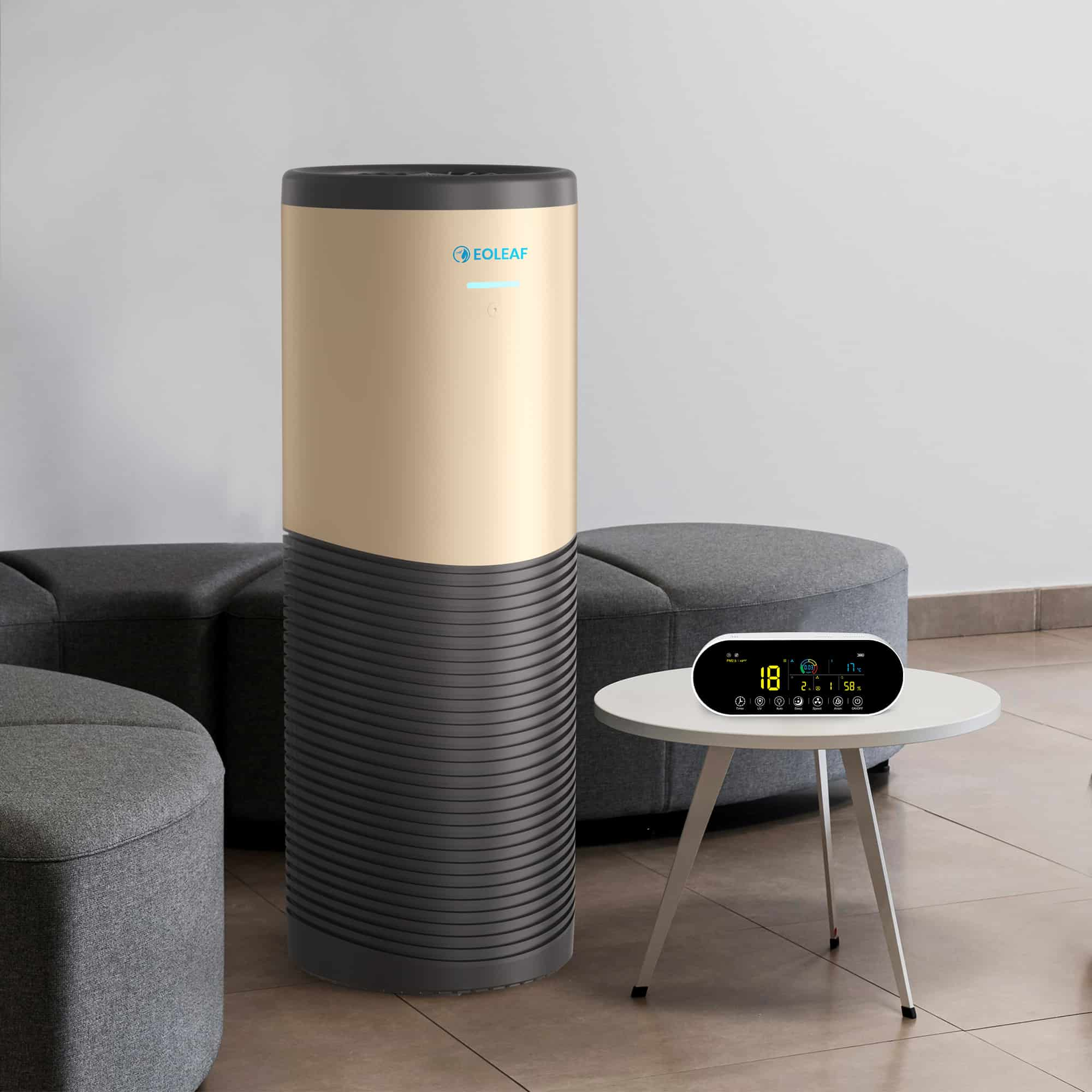 Eoleaf's AEROPRO 150 air purifier and remote control display next to a gray couch