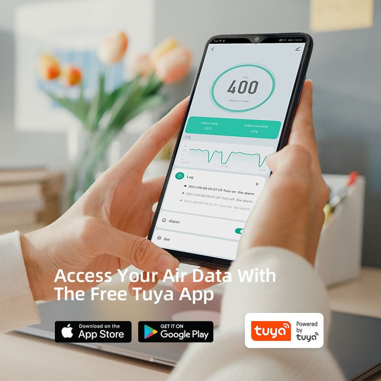 Two hands holding a smartphone using Eoleaf's the Tuya app