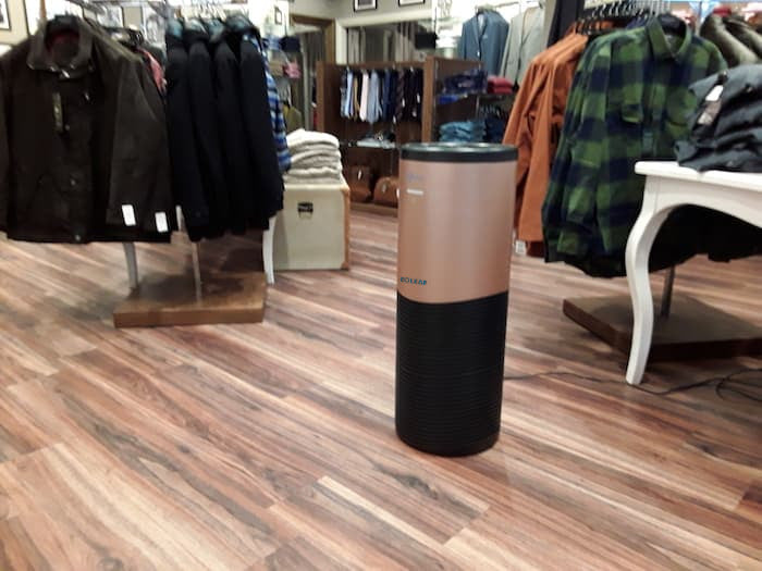 Eoleaf's AEROPRO 150 air purifier in a clothing store