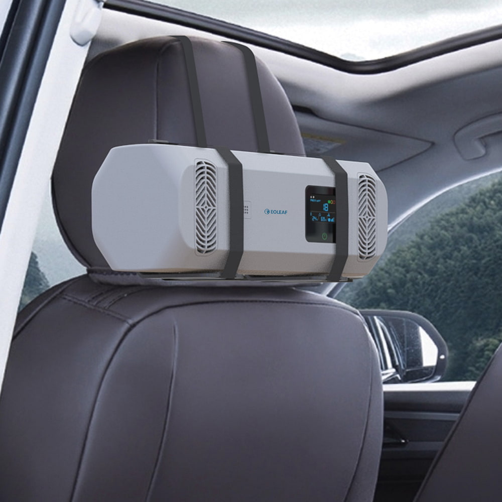 Eoleaf's Pure CAR air purifier installed behind a headrest in a car